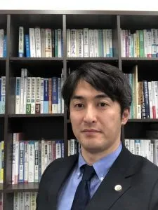 弁護士　玉真 聡志